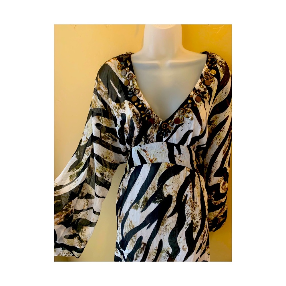 Pretty and fun dress!  Size Large.